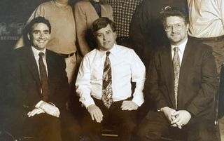 A late-’90s photo of Group One’s core management team for the elektraLite brand (left to right): Jack Kelly, Vinny Finnegan, and Norman Wright.